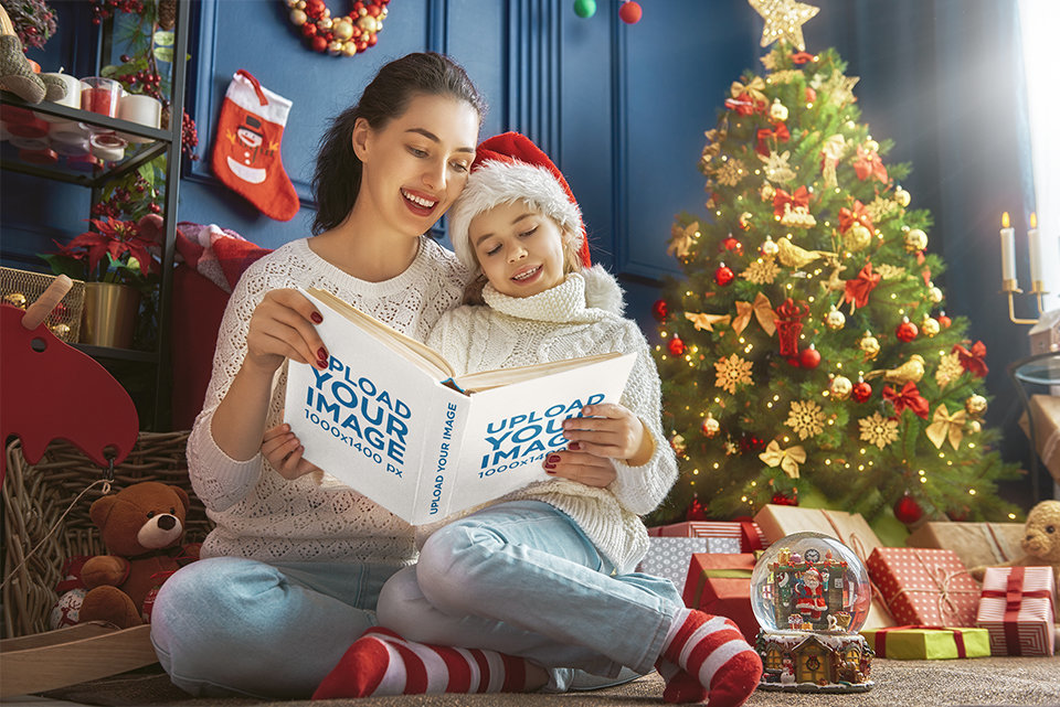 Mockup of Mother and Daughter Reading a Christmas Book