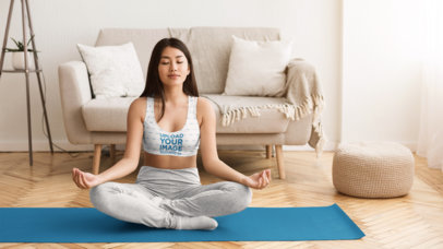 Sports Bra Mockup of a Young Woman Meditating at Home 