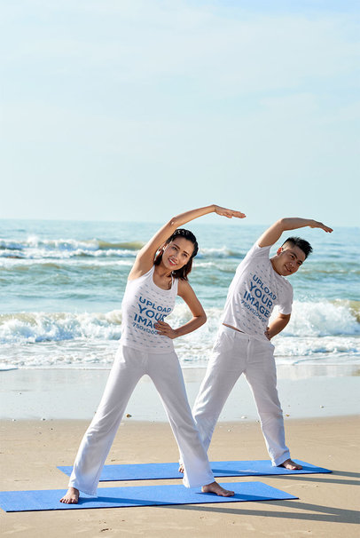 Mockup of a Couple Doing Yoga at the Beach with a Tank Top and a Tee