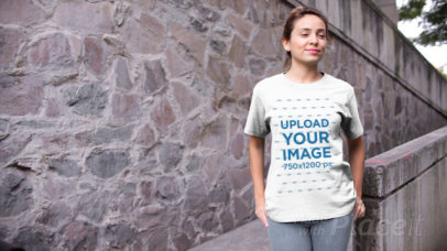 Video of a Woman Posing with a T-Shirt in an Urban Scenario