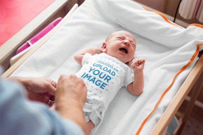 Onesie Mockup Featuring a Crying Newborn 34627-r-el2
