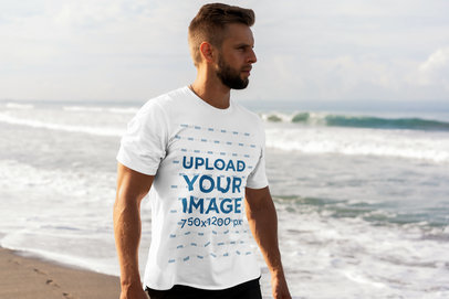 T-Shirt Mockup of a Bearded Man Looking at the Ocean