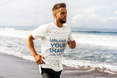 T-Shirt Mockup of a Bearded Jogger at the Beach 