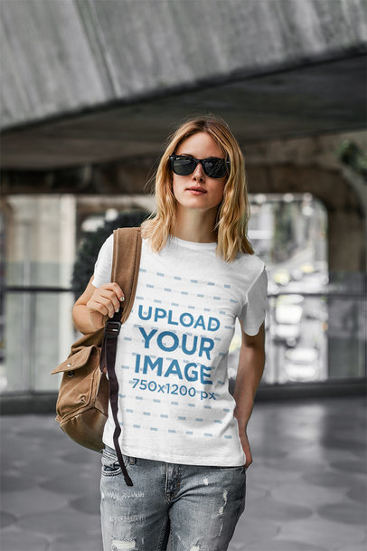 T-Shirt Mockup Featuring a Cool Woman in an Urban Setting