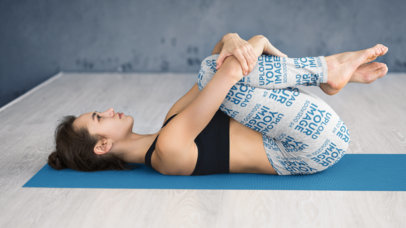 Leggings Mockup of a Woman Stretching on a Yoga Mat