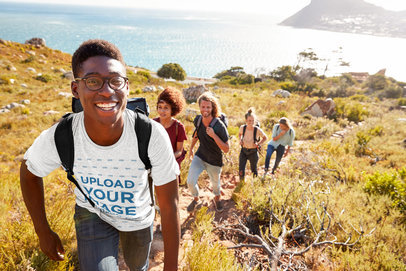 Tee Mockup of a Smiling Man with a Hiking Group