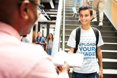 T-Shirt Mockup of a Teenager Talking to a Teacher