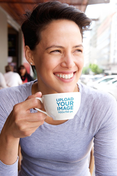 Mockup of a Smiling Woman with Short Hair Holding an Espresso Cup 34796-r-el2