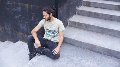 T-Shirt Video Mockup of a Cool Bearded Man Relaxing in an Urban Scenario
