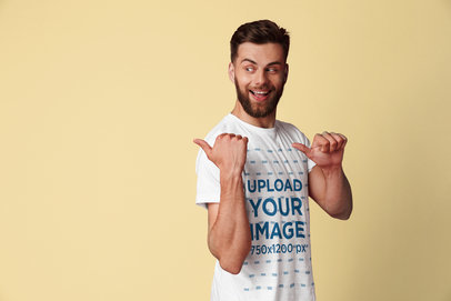 Mockup of a Funny Man Wearing a Round Neck Tee at a Studio