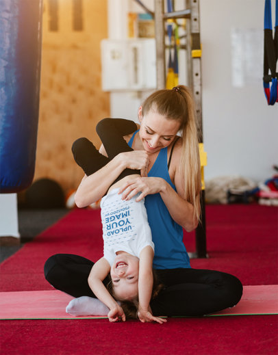 T-Shirt Mockup Featuring a Girl Playing with Her Mom