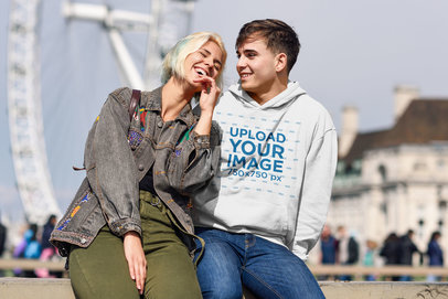 Mockup of a Man with His Girlfriend in Front of London's Eye