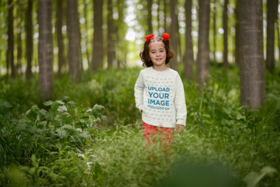 Mockup of a Little Girl Wearing a Heathered Sweatshirt in the Woods 34692-r-el2