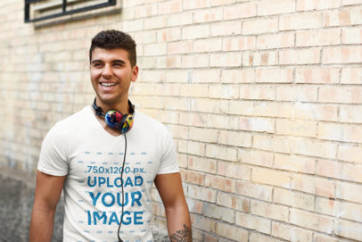 V-Neck Tee Mockup of a Smiling Man with Headphones