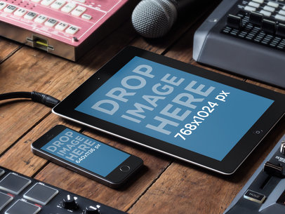 Responsive Mockup Featuring an iPhone 5s and an iPad at a DJ Studio