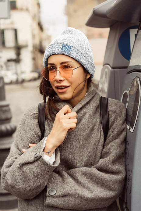 Mockup of a Woman Wearing a Wool Beanie on a Chilly Day 