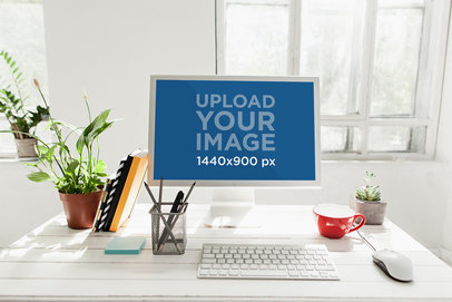 Mockup of a Desktop Computer Placed on a Desk by an Indoor Plant 36546-r-el2
