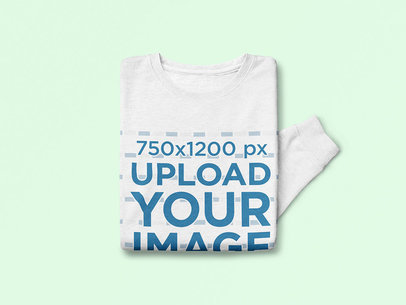 Mockup of Folded Sweatshirt on a Colored Surface