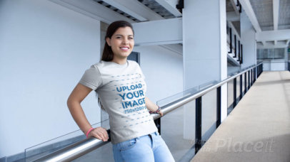 T-Shirt Video of a Woman Smiling on a Building Runway