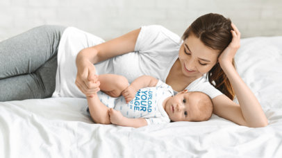 Onesie Mockup Featuring a Baby with His Mom in Bed