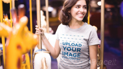 T-Shirt Video of a Woman Having Fun on a Carrousel 13543