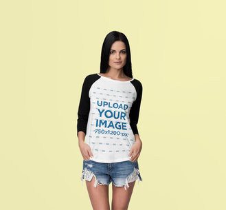 Mockup of a Woman Wearing a Raglan Long Sleeve Tee at a Studio 