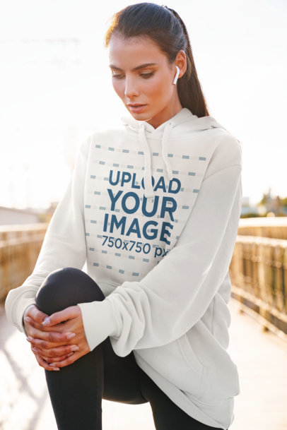 Hoodie Mockup of a Woman Getting Ready to Go for a Run