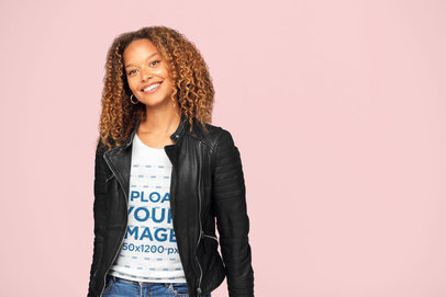 Heathered Tee Mockup of a Woman with Curly Hair Smiling at a Studio