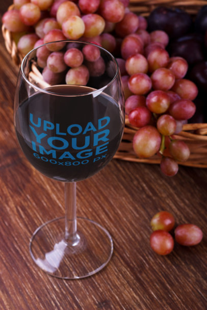 Mockup Featuring a Wine Glass Next to Some Grapes 36470-r-el2