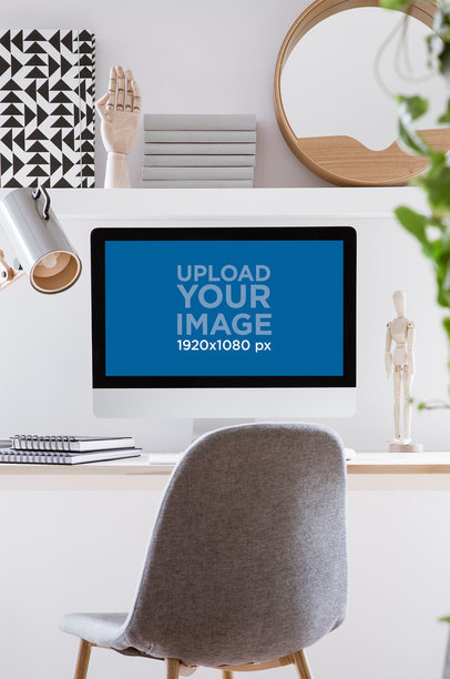 Mockup of an iMac Placed in a Minimalist Workspace