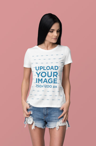 T-Shirt Mockup of a Long-Haired Woman Posing Against a Plain Color Backdrop