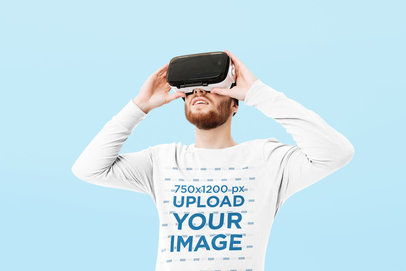 Long-Sleeve Tee Mockup of a Man with a VR Visor at a Studio