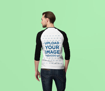 Back View Mockup of a Man Wearing a Raglan Long-Sleeve Tee at a Studio