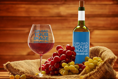 Elegant Mockup of a Wine Glass and a Bottle in a Wooden Setting