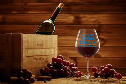 Mockup of a Wine Glass by a Vintage Box in a Warm Setting 36822-r-el2