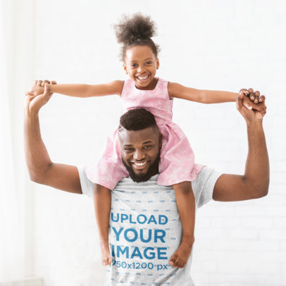 T-Shirt Mockup of a Happy Dad Carrying His Daughter on His Shoulders 