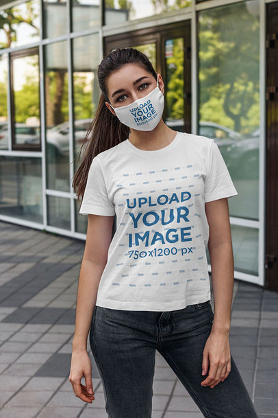 T-Shirt Mockup of a Woman Wearing a Face Mask on the Street