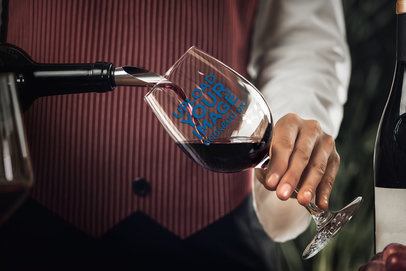 Mockup of a Sommelier Pouring Liquor into a Wine Glass
