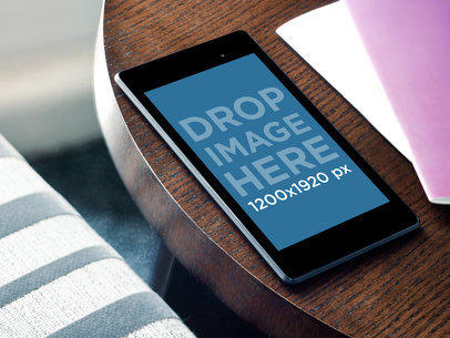  Nexus 7 Mockup Featuring a Round Small Table 