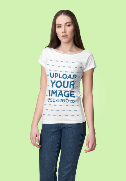 Mockup of a Woman Posing at a Studio While Wearing a Customizable T-Shirt
