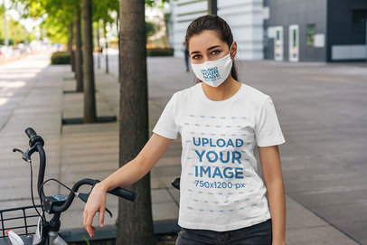 Mockup of a Woman Wearing a T-Shirt and a Face Mask