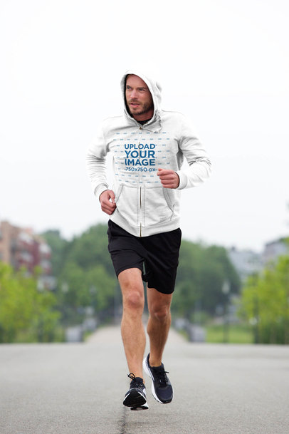 Heathered Full-Zip Hoodie Mockup of a Fit Man Jogging Outside 34082-r-el2