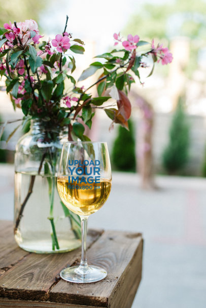 Wine Glass Mockup Featuring a Vase with Flowers 36861-r-el2