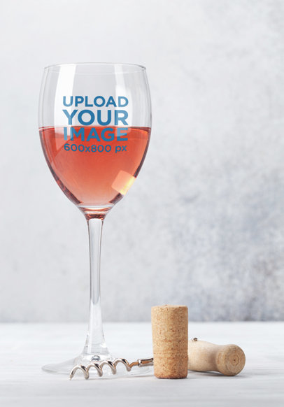 Mockup of a Wine Glass Next to a Cork 36783-r-el2