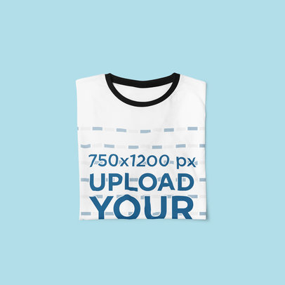 Mockup Featuring a Folded Ringer T-Shirt Placed on a Colored Surface 4391-el1