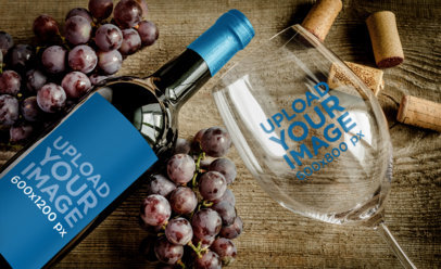 Mockup of a Wine Bottle and a Wine Glass Next to Fresh Grapes