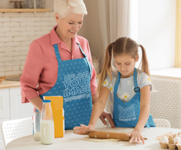 Apron Mockup Featuring a Grandma and Her Granddaughter Baking 34701-r-el2