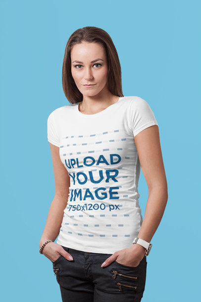 T-Shirt Mockup of a Woman at a Studio Posing With Her Hands in Her Pockets