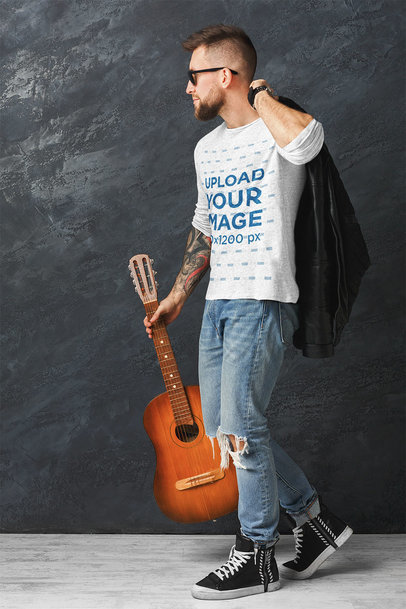 Long-Sleeve Tee Mockup of an Artist Holding a Guitar 