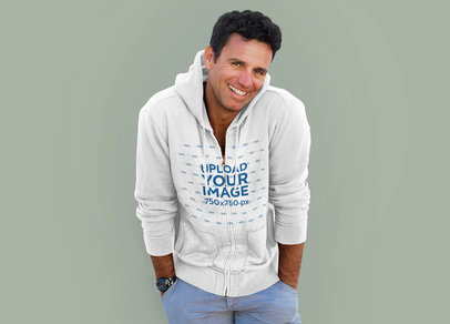 Mockup of a Man with a Heathered Full-Zip Hoodie at a Studio